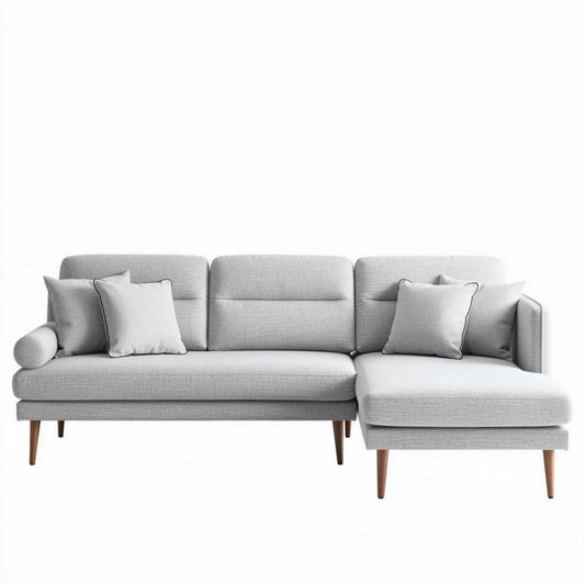 Canapé d'angle en tissu gris clair avec coussins et dimensions 210 x 90 x 85cm